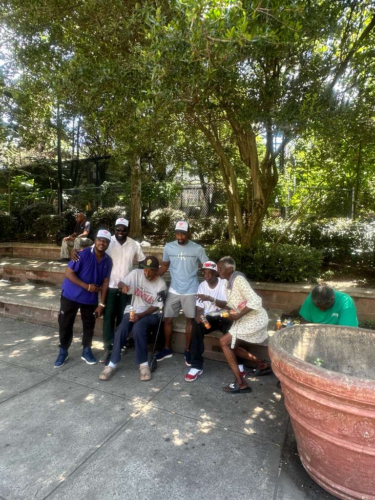 Volunteers with community members