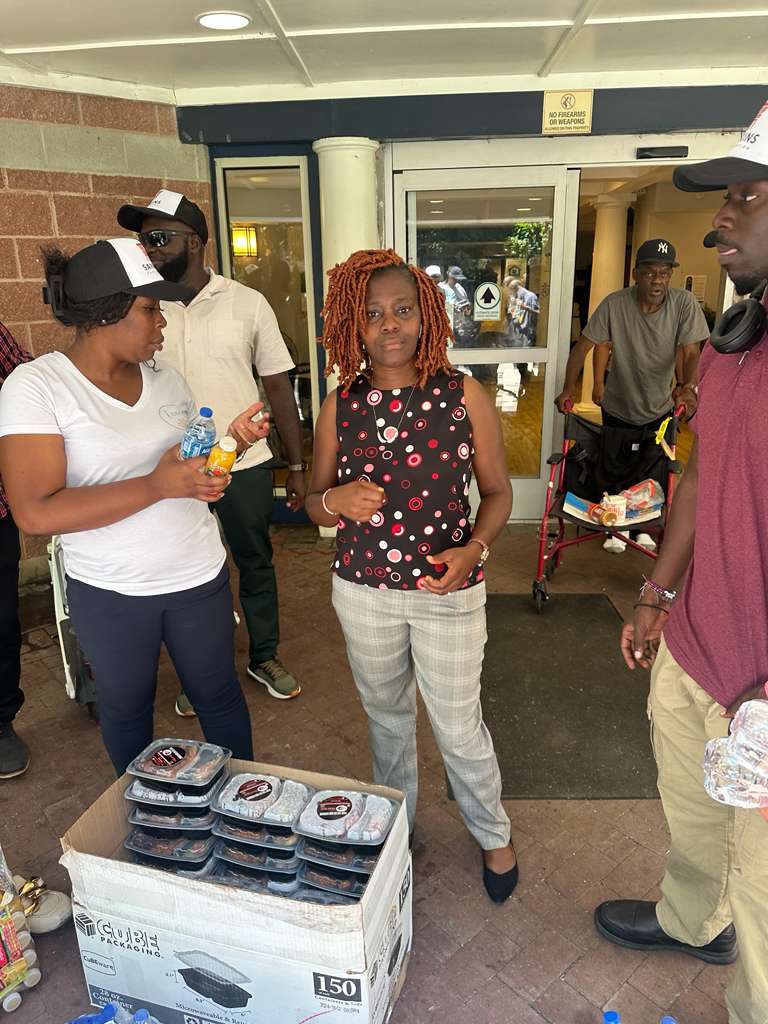 Heritage Legacy of Hope volunteers preparing meals for distribution in Atlanta